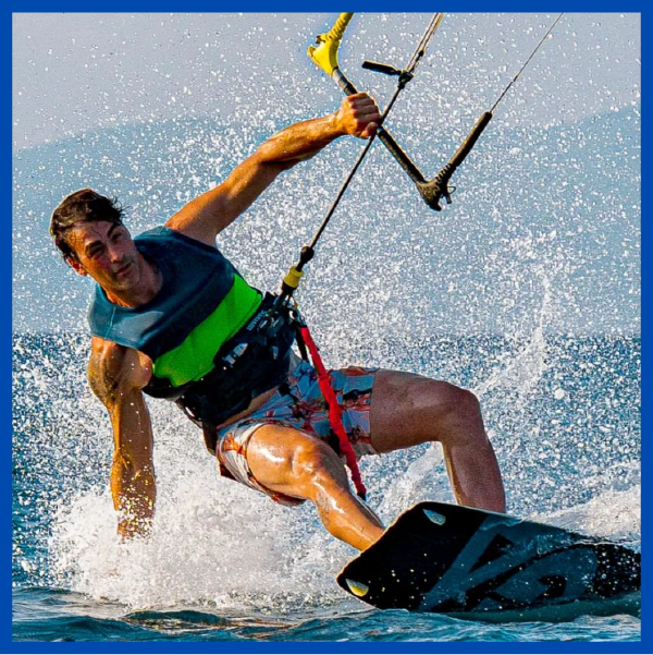 Kitesurfer touching water